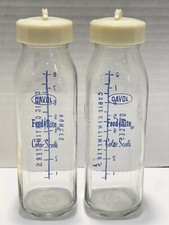 2 Vintage 8oz Davol Glass Baby Bottles With Extra Lids