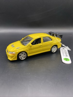 Racing Champions Mitsubishi Lancer Evolution VII Yellow 1:64 Diecast Ertl F&F