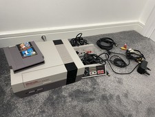 NINTENDO NES CONSOLE with 2 controllers and Mario Bros/ Duckhunt game