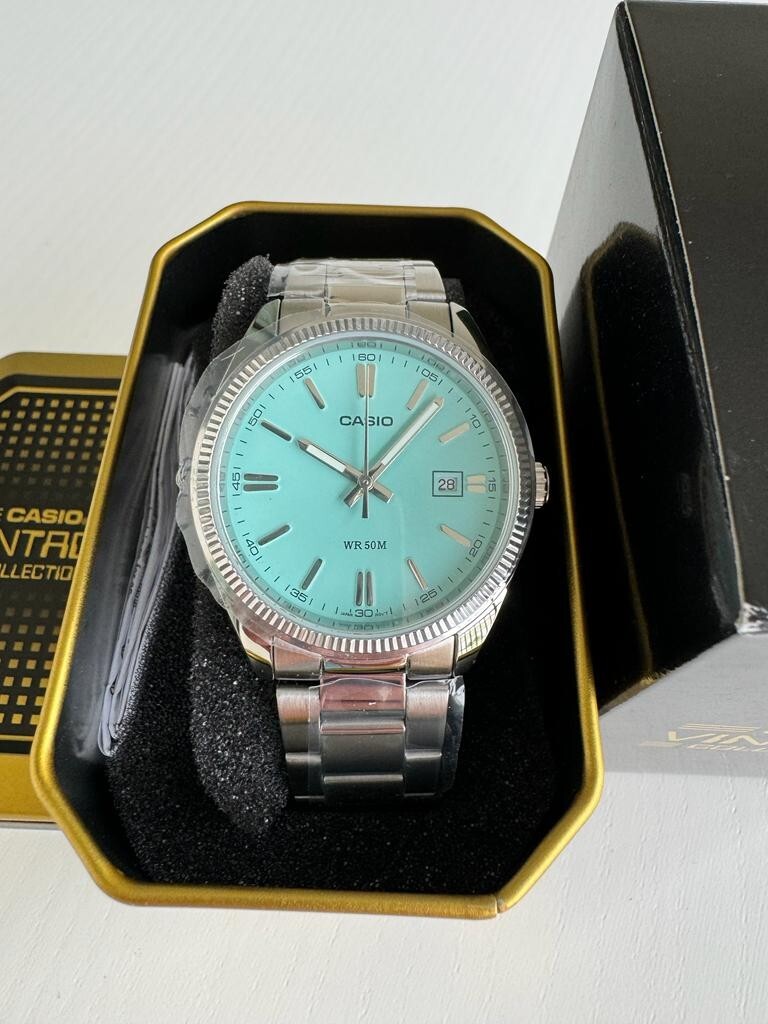 CASIO グリーンカラー デイトアナログモデル ターコイズブルー CASIO グリーンカラー デイトアナログモデル ターコイズブルー CASIO