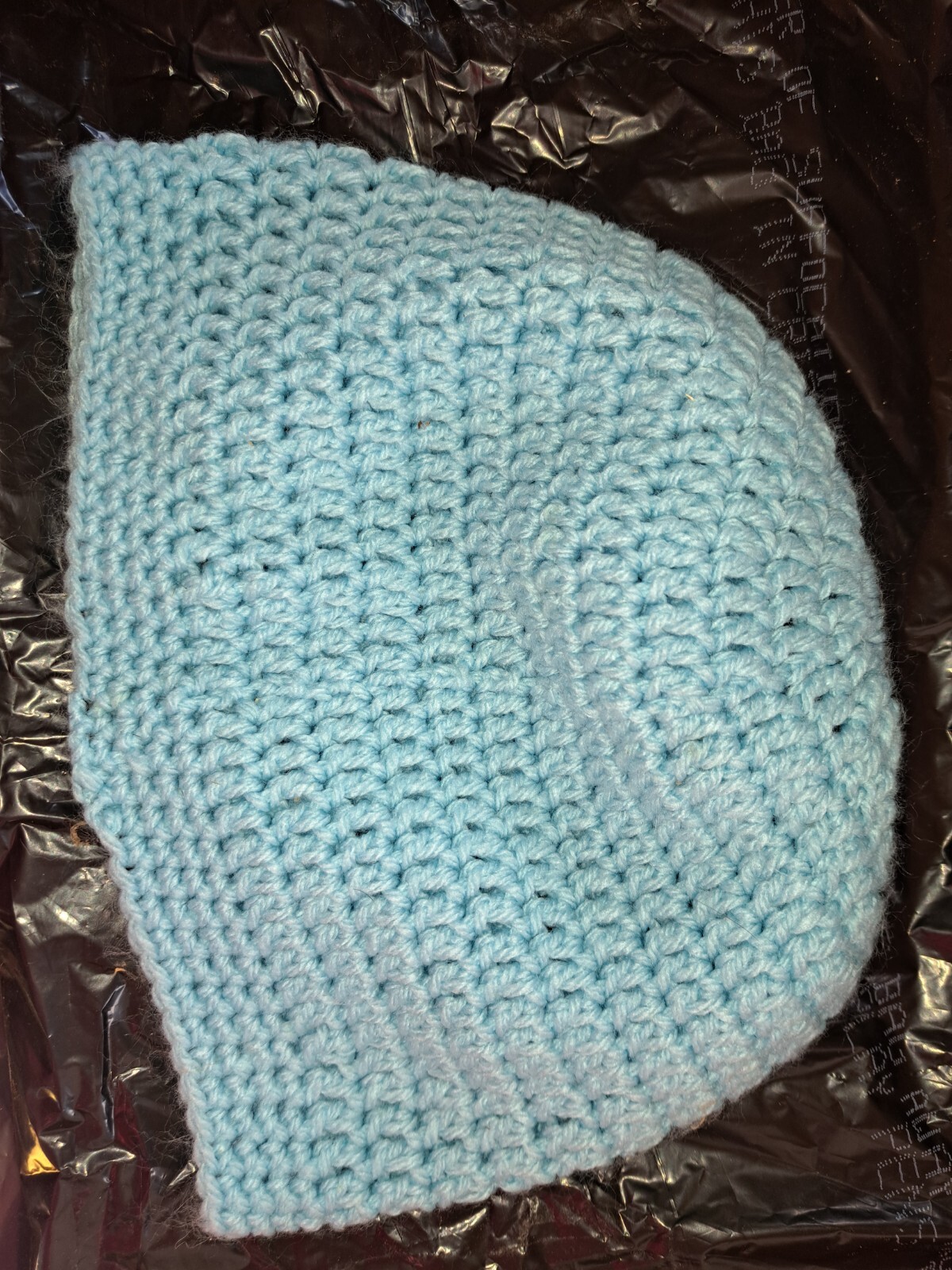 Splendido cappello all'uncinetto panino disordinato coda di pony