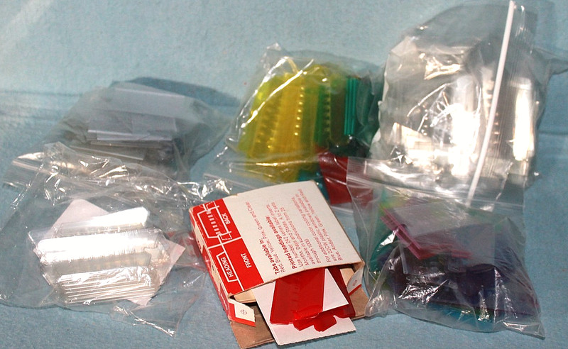 12 ounces of 2" mixed color hanging file folder plastic tabs & inserts (dozens!)