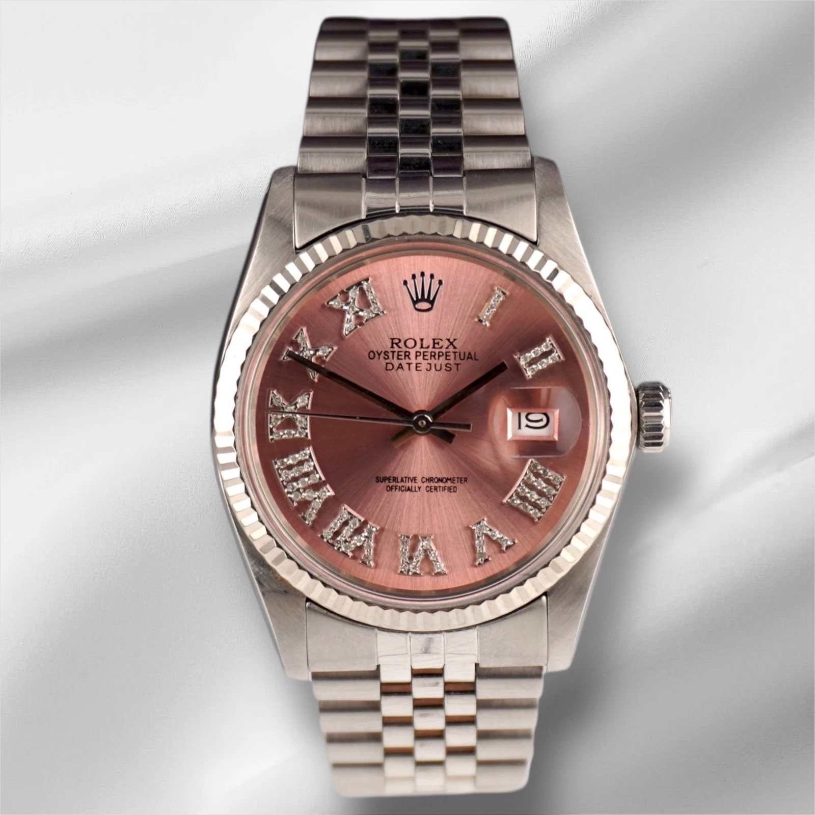Rolex — Rolex 36mm Datejust Steel Fluted Peach Roman Diamond Dial Watch 16014