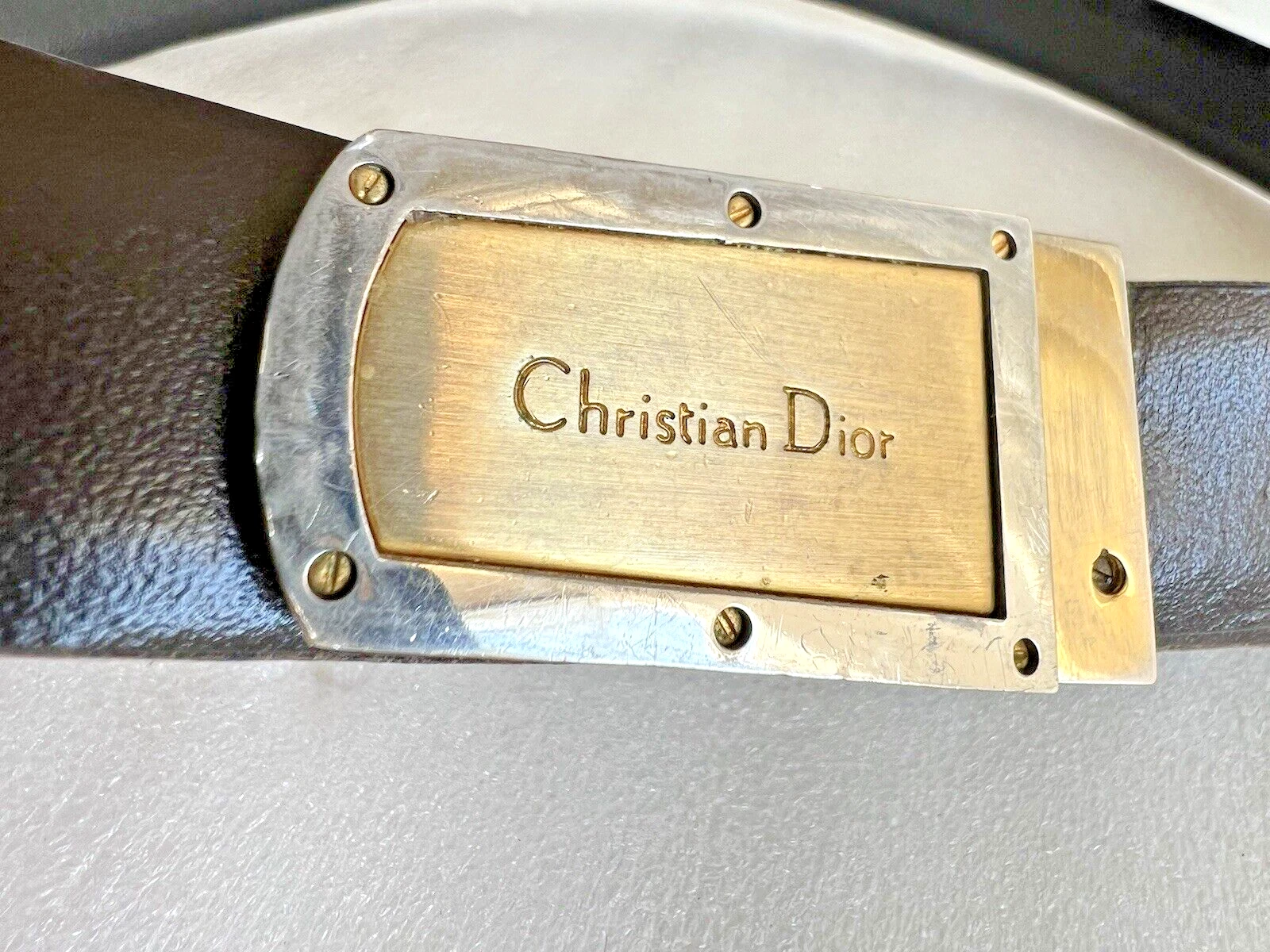 Ceinture vintage en cuir noir ton argent et or logo Christian Dior x 35