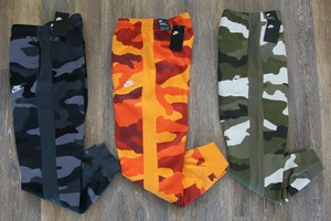 black and orange nike sweatpants