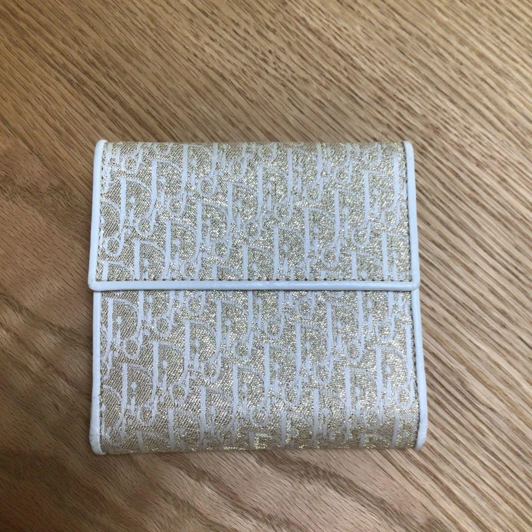 Portefeuille pliant trotteur doré Christian Dior