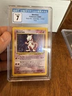 Mewtwo Base Set Unlimited Holo Card 10/102 CGC 7 NM Pokémon