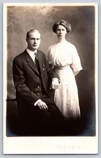 Couple in Formal Attire – Resberger’s Studio c.1900s