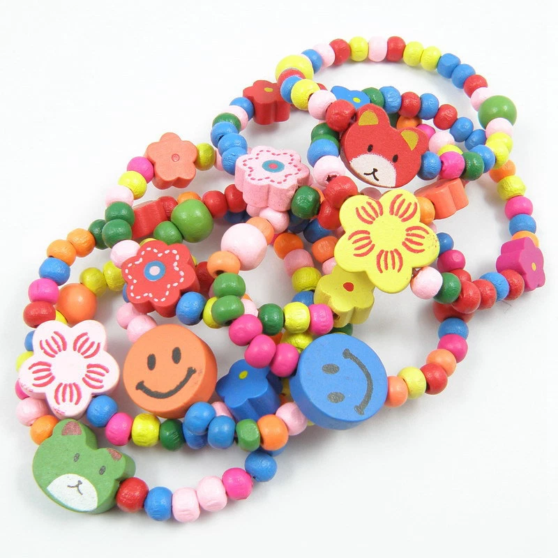 24x Mezcla Madera Elástica Niños Cuentas Pulseras Niños Fiesta Bolsa Rellenos Joyería Lotes Foto 4 de 4
