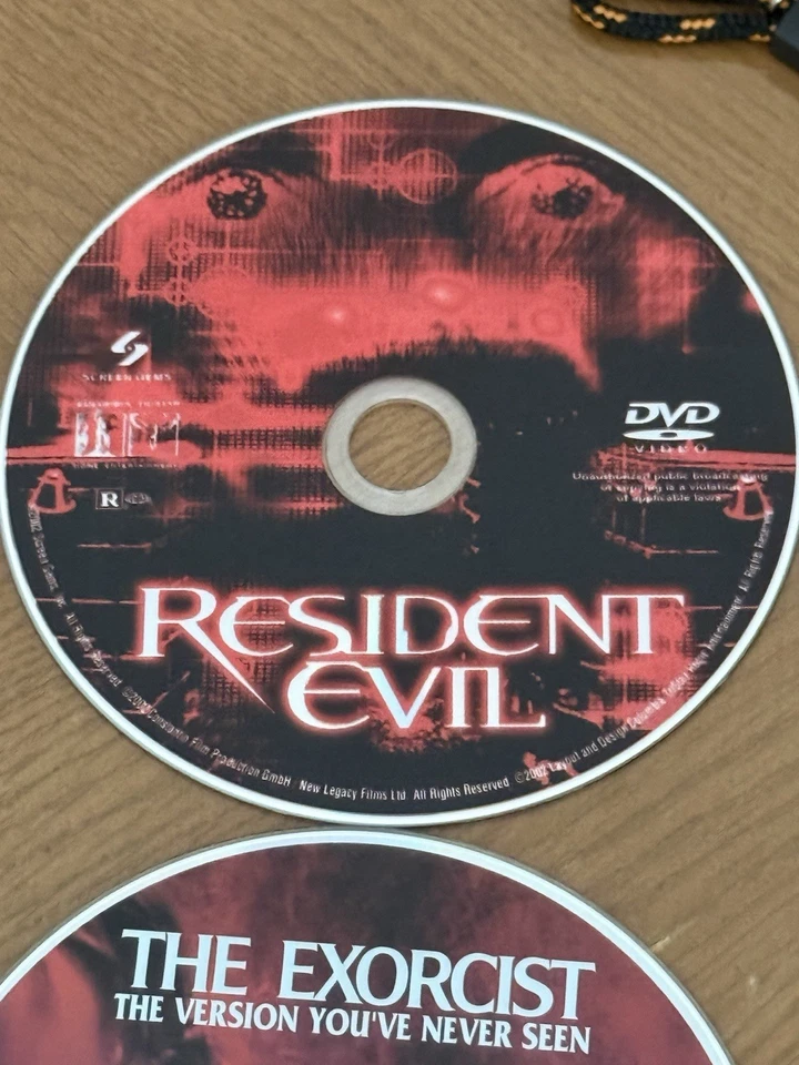 Juego de 6 DVD en una hermosa bolsa de almacenamiento naranja Eastsport para CD/DVD. Foto 2 de 4