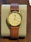 Vintage SEIKO QUARTZ 7N43- 8A89 R1, WRIST WATCH LEATHER BANK GOLD CASE, JAPANESE