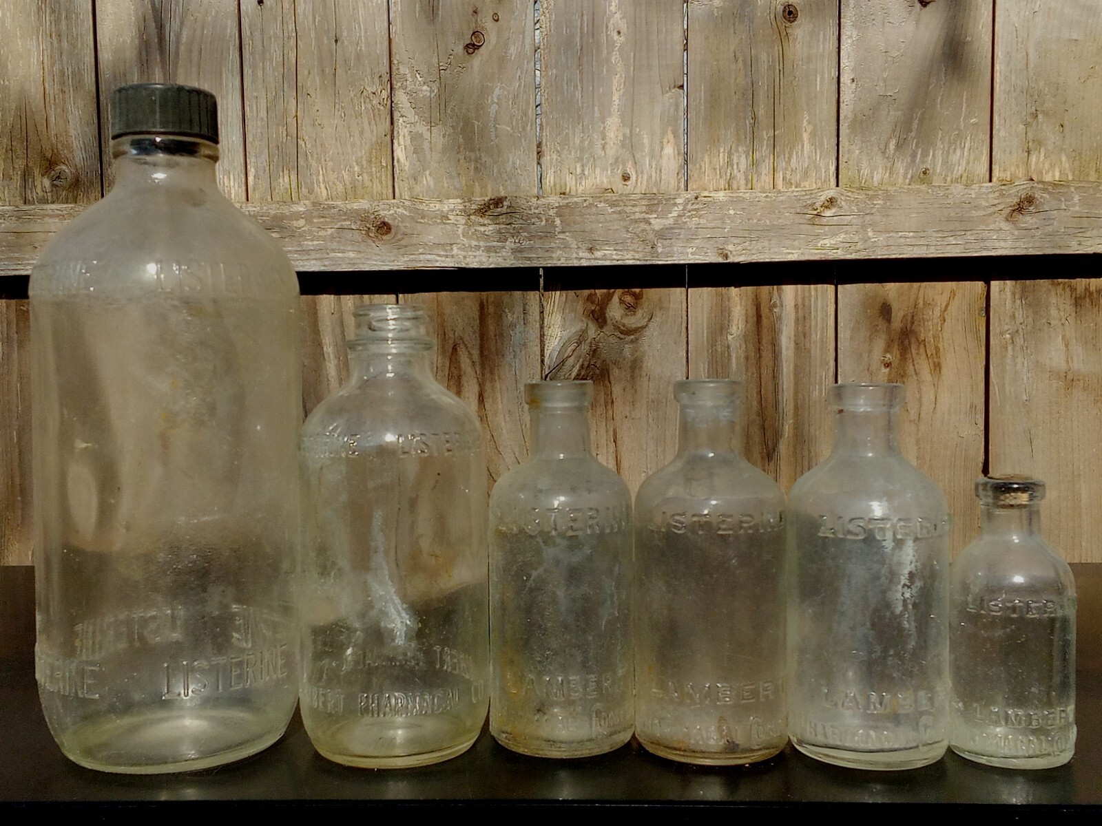 LOT OF 4 ANTIQUE LISTERINE LAMBERT PHARMACAL CORK TOP BOTTLES 2 SCREW