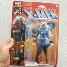 Marvel Legends Retro Storm Black Costume figure in hand