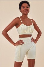 Bralette top with matching cycling shorts gym set size S 8 cream
