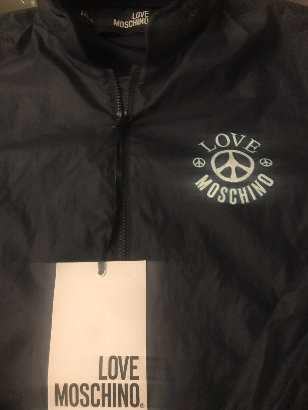 Prezzo consigliato £347!!! Giacca a vento Moschino leggera con zip e cappuccio nuova