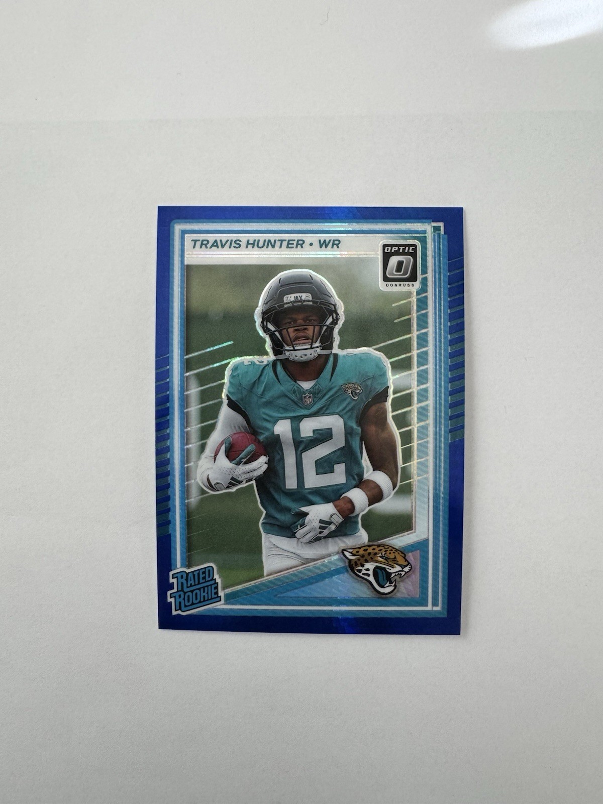 2025 Panini Donruss Optic - Rated Rookie Travis Hunter #201 Blue Hyper Prizm RC
