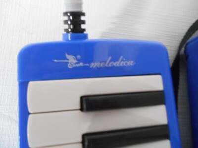 Older Melodica (Piano-Harmonica Combination) by Swan Musical