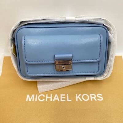Camera bag  8.5''W X 5''H X 2.25''D  Exterior details: back slip pocket, front pock