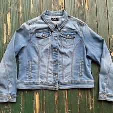 Light wash denim jacket with button-up closure