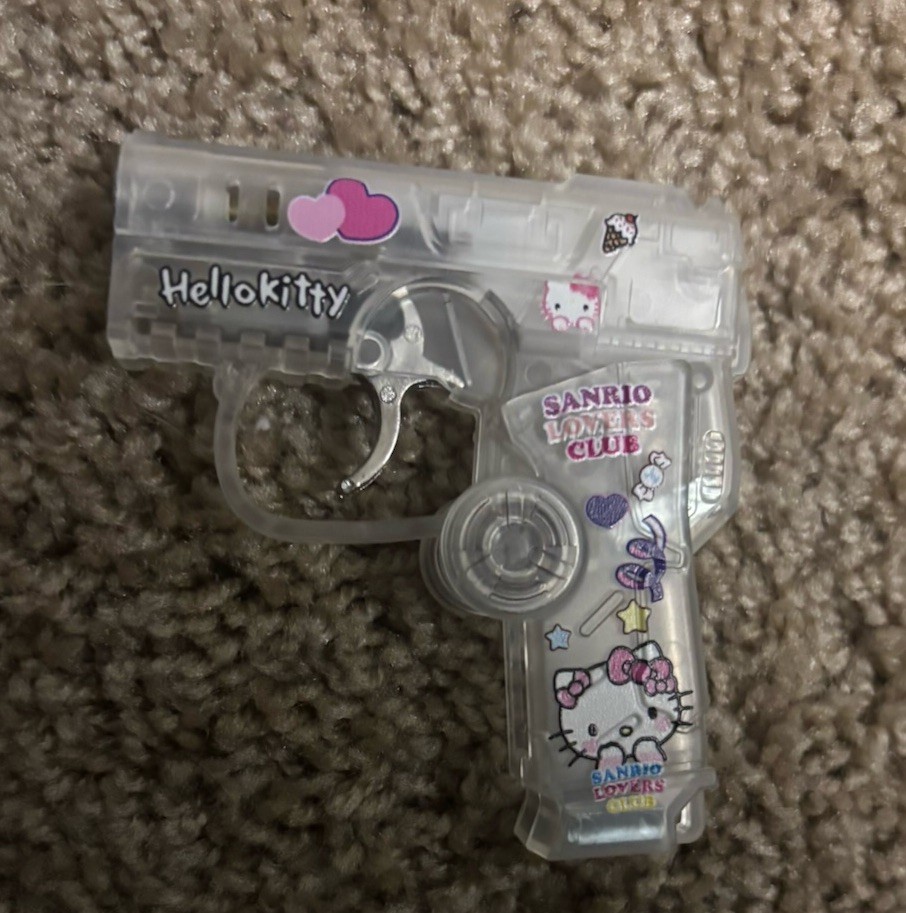 Light Up Spinning Hello Kitty Gun Lighter