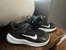 Nike toddler 5.5 black and white trainers.