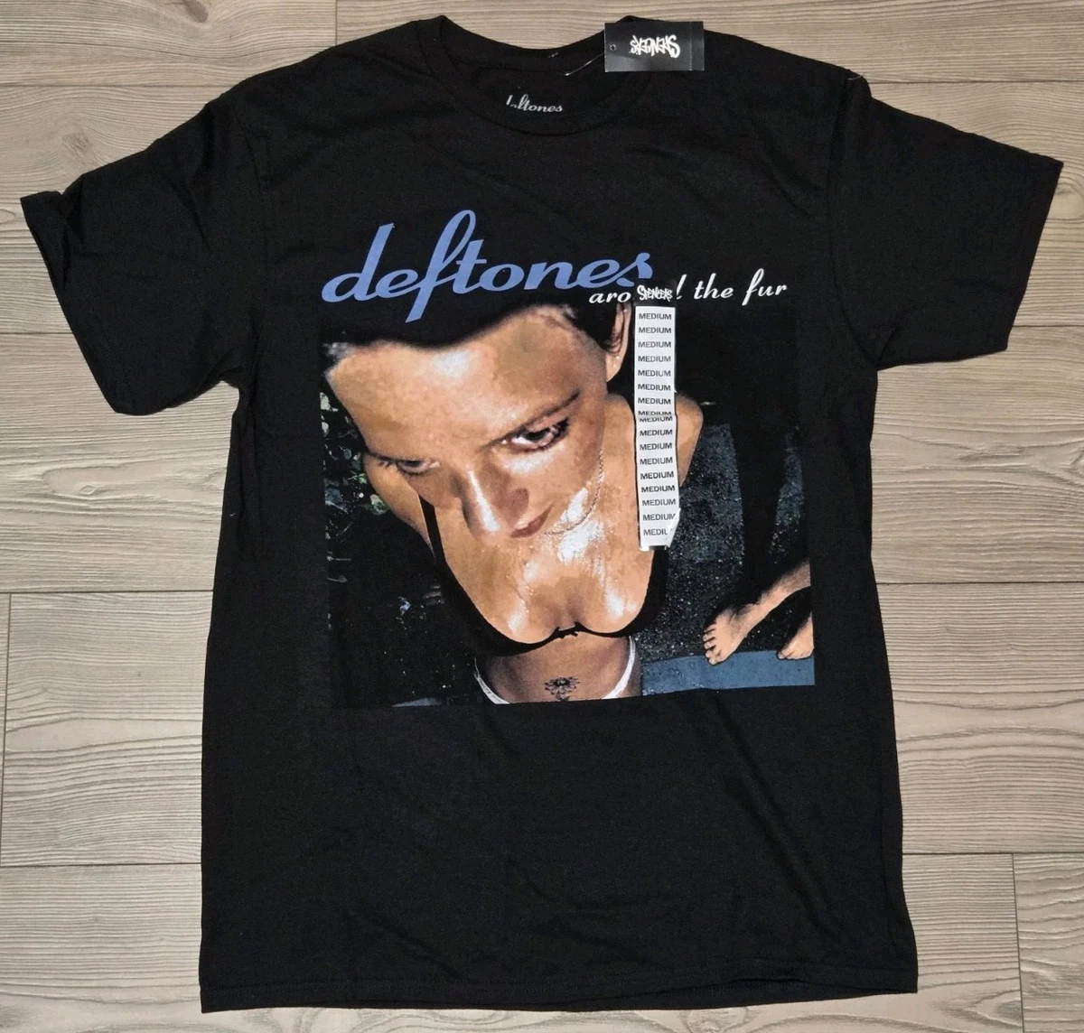 Buy the Rock Off Deftones Star And Pony T Shirt in Black