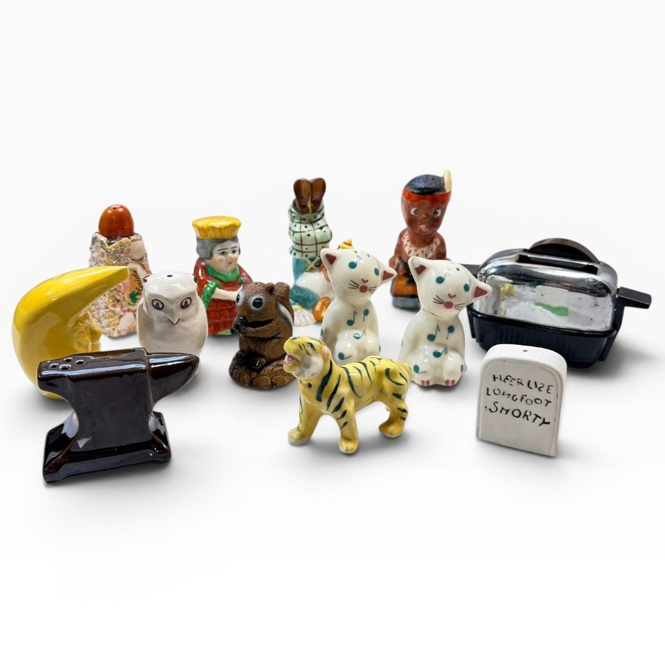 A chaotic little lot of 13 mismatched Japan-made novelty animal salt & pepper shaker singles — each one a tiny ceramic character with a story.