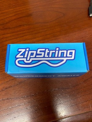 The Original ZipString As Seen on TV Tested Three Strings & Charger Included.