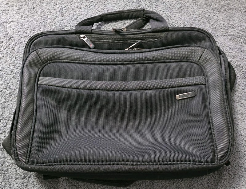 Solo Black Laptop Briefcase Style Travel Bag With Shoulder Strap and Handles