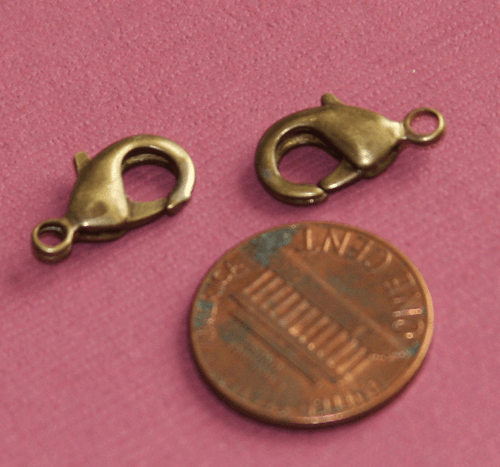 15 pcs of Antique Brass Lobster Clasps 15x8mm - Picture 2 of 5