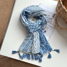 Versatile, exquisite, and atmospheric sun-protection shawl.