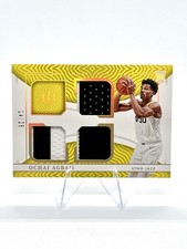 Ochai Agbaji 2022 National Treasures Rookie Triple Materials Prime #RTM-OAU