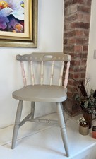 Vintage hand painted chair in soft pastel follower with floral motif