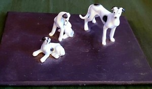 Unique 7" Wood Base with 3pc Small Ceramic Puppy Dog Figurines