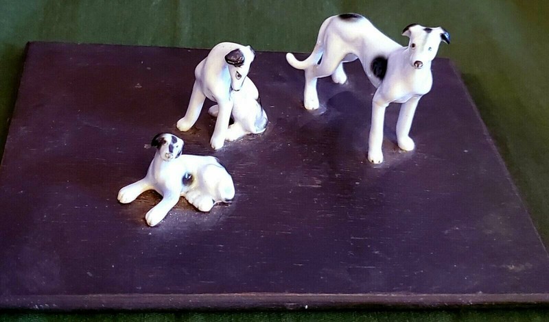 Unique 7" Wood Base with 3pc Small Ceramic Puppy Dog Figurines