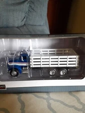 NIB 1/64 Blue Pete 385 Stakebed SpecCast