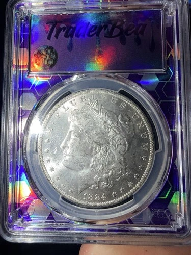 1884-O Morgan Silver Dollar • PCGS MS62 Brilliant Luster - TraderBea Purple Core