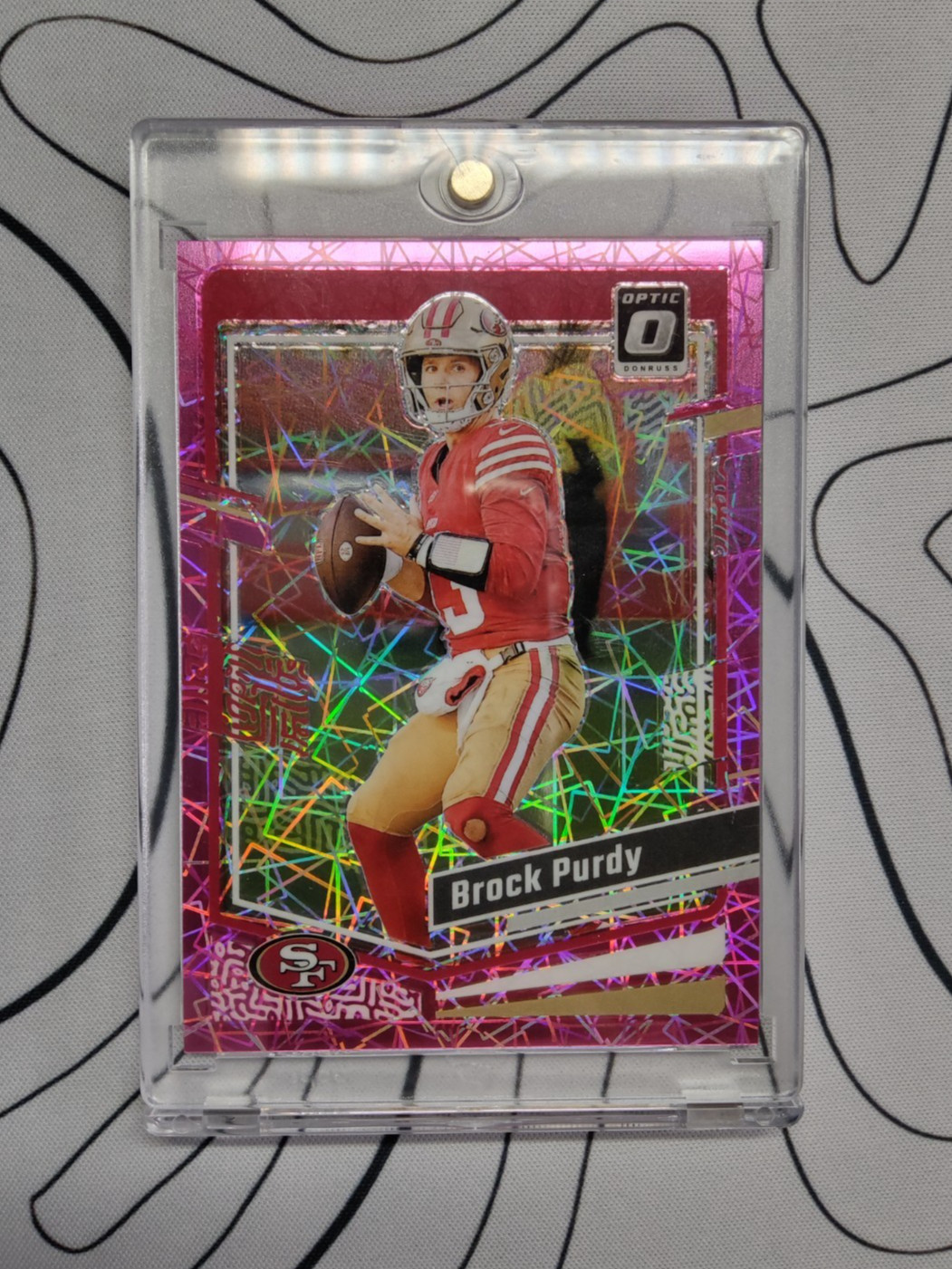 Brock Purdy 2023 Panini Donruss Optic 168 Pink Velocity /79 San Francisco 49ers