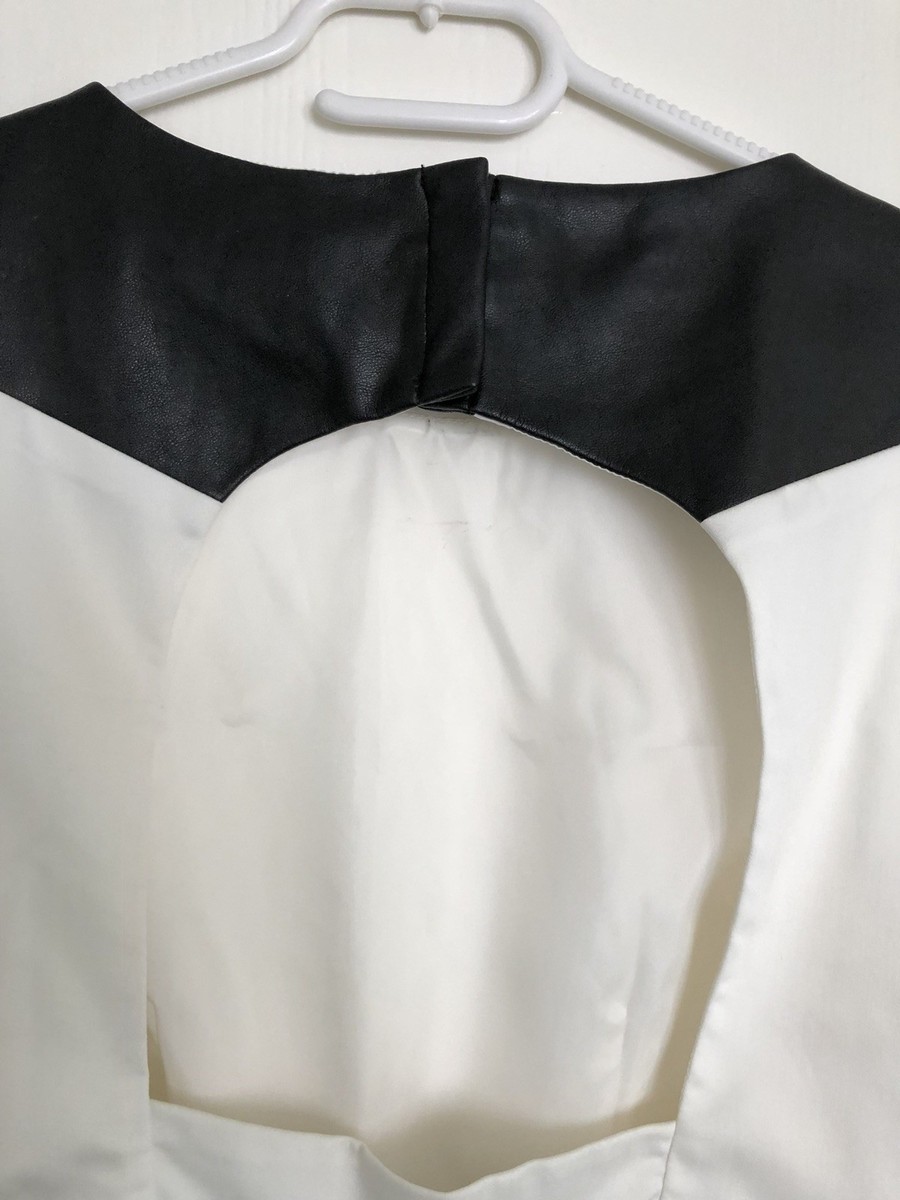 Robe courte Yveline FERMINE taille (36-38), en lainage noir Robe courte Yveline FERMINE taille (36-38), en lainage noir