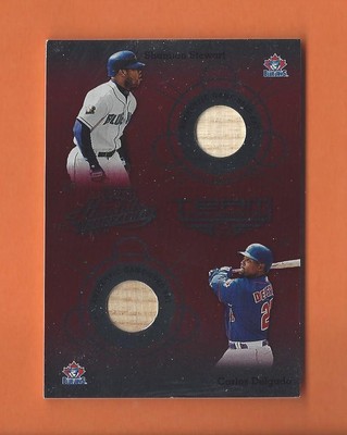 2002 ABSOLUTE TEAM TANDEMS SHANNON STEWART CARLOS DELGADO GAME-USED BATS #TT-30