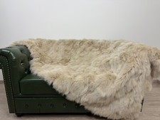 Luxury beige fur blanket throw. Real fur fox blanket, fluffy fur blanket
