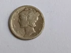 1928-s silver mercury dime.