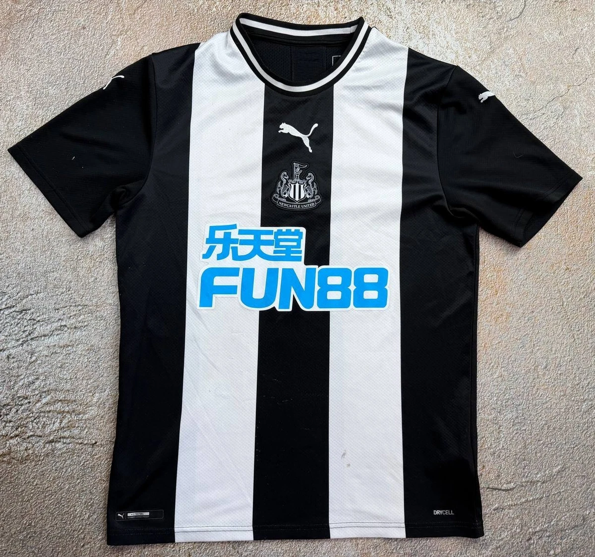 Preços baixos em Multicor Newcastle United International Club