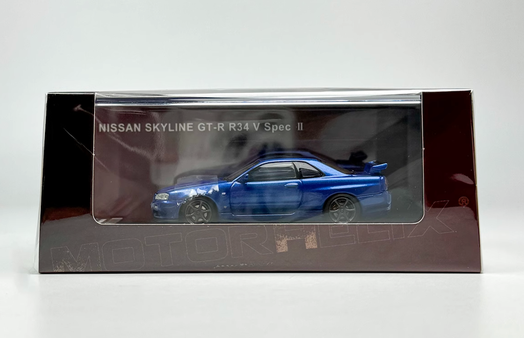 Miniature De Collection : Nissan Skyline GTR R34 VSpec II Bleu - Modèle 1:64 Motorhelix - Édition Limitée 2023