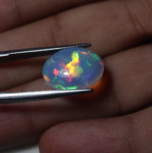 4.96 Carat 16.6x12 MM Natural AAA Multi Flashy Fire Ethiopian Opal Oval Cabs - Imagen 3 de 15