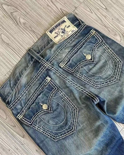 Jeans marca high street fashion americana con filo spesso bianco e grande Buddha - Foto 15 di 19