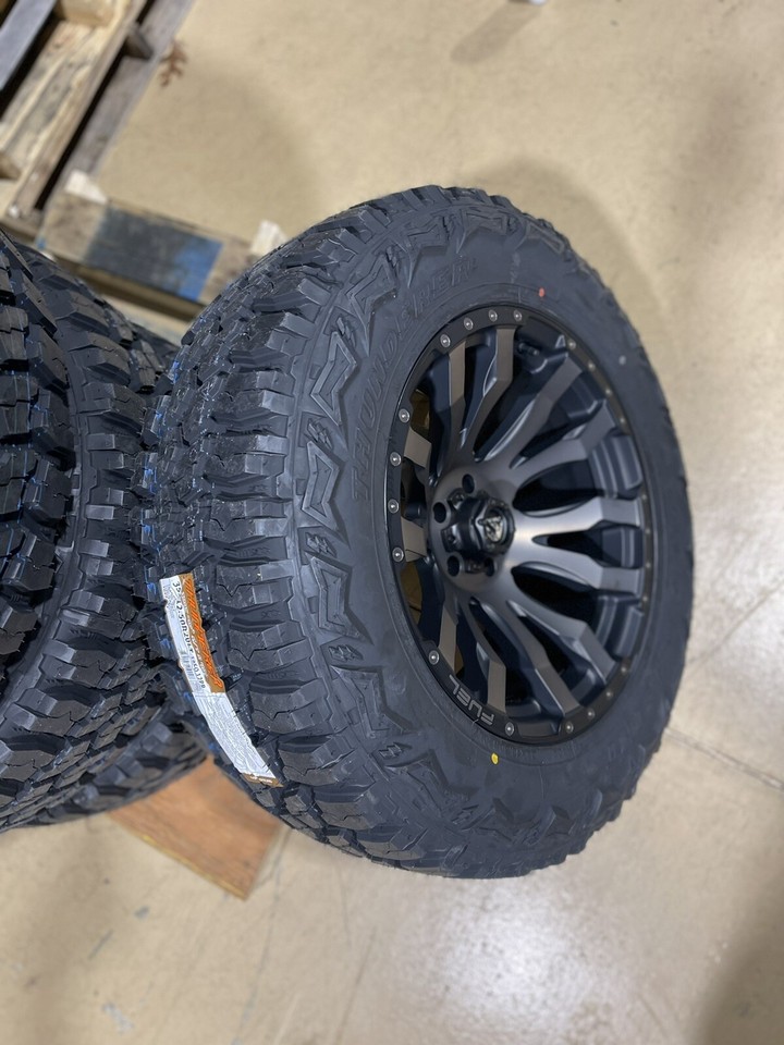 4 20x10 Fuel D674 Blitz Black Wheels Rims 35" MT Tires 6x5.5 Dodge Ram