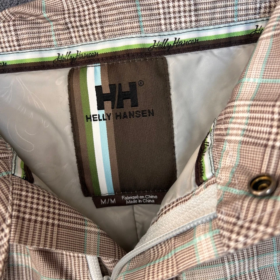 Pantalones de esquí snowboard Helly Hansen medianos 34x32 a cuadros marrón tostado aislados Foto 3 de 4