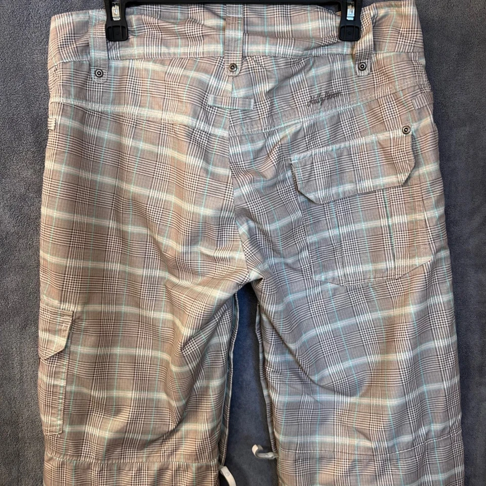Pantalones de esquí snowboard Helly Hansen medianos 34x32 a cuadros marrón tostado aislados Foto 4 de 4