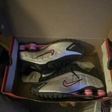 Nike women’s Shox-Black and Metallic Silver w/Pink Accents